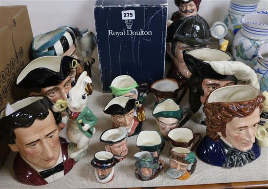 A collection of Royal Doulton character jugs,